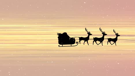 Snow-falling-on-santa-claus-in-sleigh-being-pulled-by-reindeers-against-yellow-light-trails