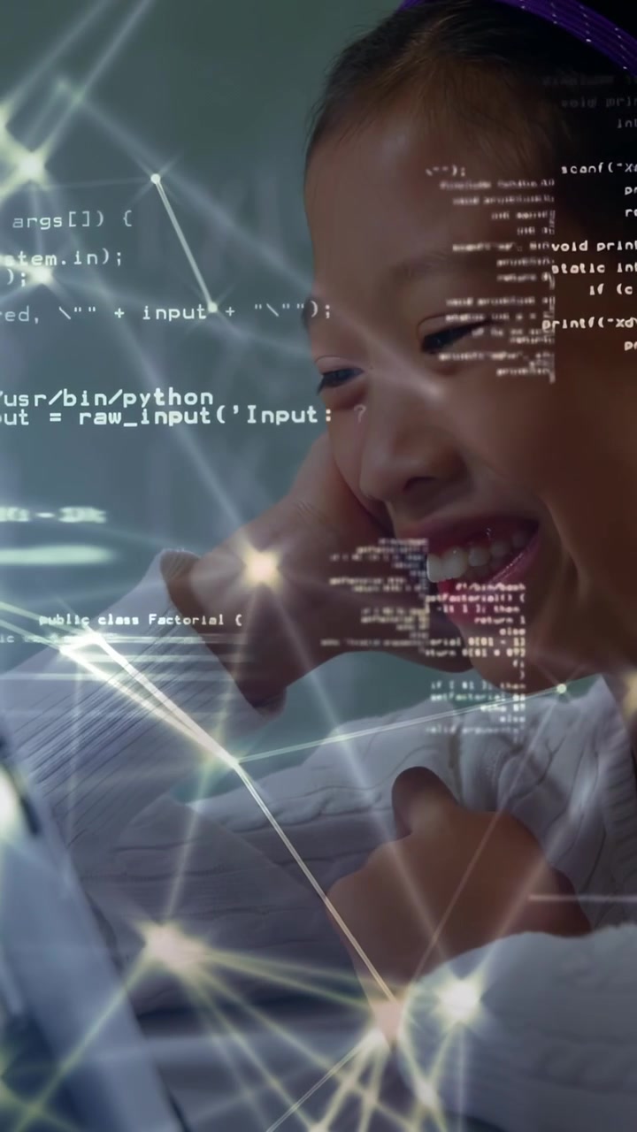 Vertical video: Girl tapping tablet, leaning in, watching code and nodes projecting for education