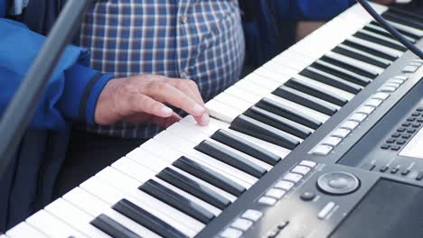 person playing a keyboard