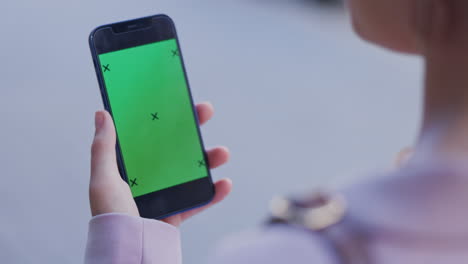 Woman,-hands-and-phone-with-green-screen-tracking