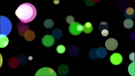 Animation-of-christmas-fairy-lights-flickering-over-black-background