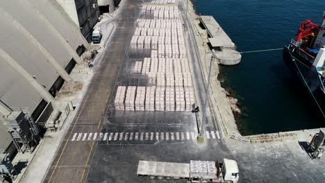 large cement factory near sea aerial view