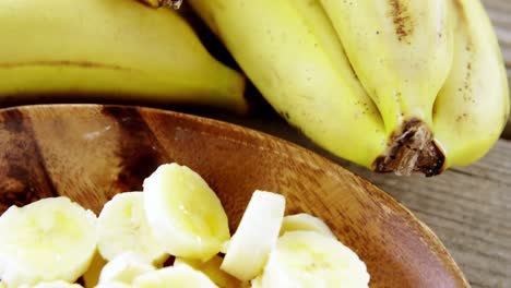 bananas in wooden bowl