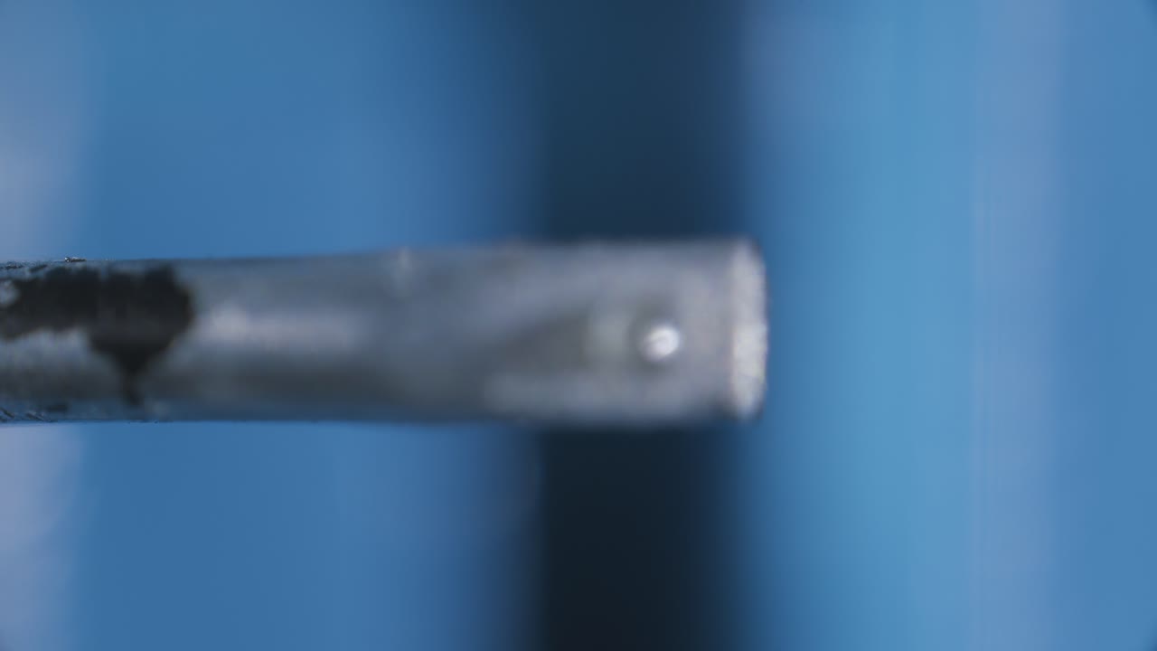 Turntable diamond stylus under microscope