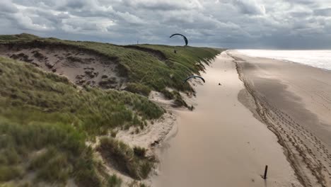 Wide-sandy-beach-of-Langevelderslag-Noordwijk-with-two