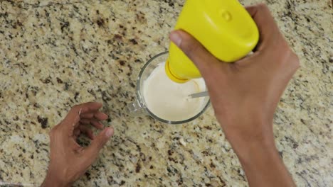 adding mustard to the sauce, home cooking