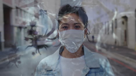 animation of covid 19 cells moving over woman in face mask