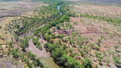 Aerial-view-of-crowds-gathering-at-the-cermony-site,-at-the-end-of-the-Freedom-Day-Festival-march-in-Kalkaringi,-Northern-Territory,-Australia