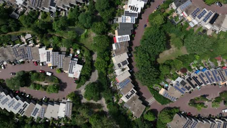 Spinning-birdseye-view-of-the-Rozendaal-neighborhood-located-in-the-town-of-Leusden,-and-was-built-in-the-1970s-with-is-easily-recognizable-curved-design-and-sustainable-initiatives