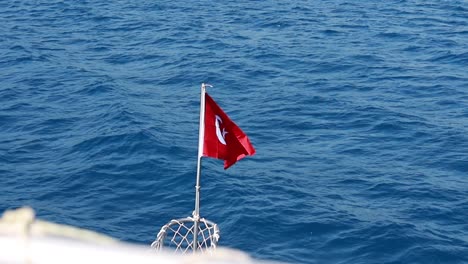 turkish flag on the sea ferry between the districts of istanbul.