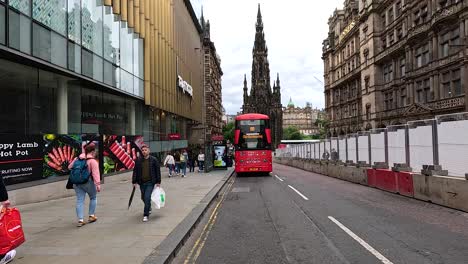 people walking near a bus in edinburgh