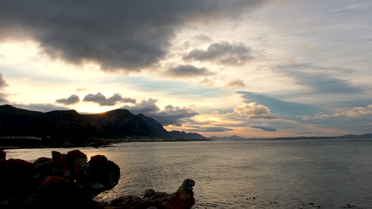 Scenic skyscape at sunrise over Walker Bay in Hermanus, Western Cape