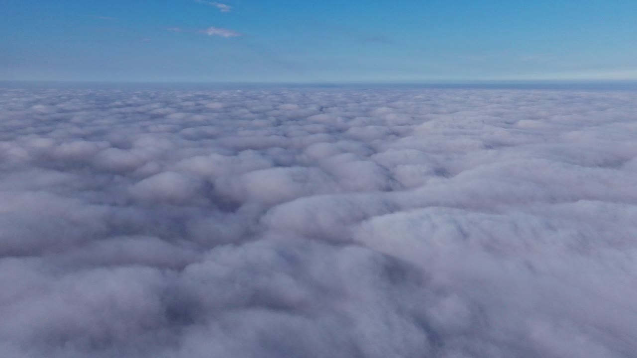 Time lapse view of thick cloud formations flowing like waves across Europe