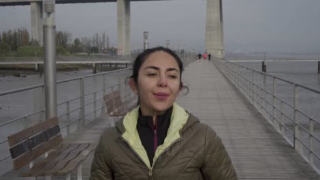 Happy-hindu-woman-training-on-seaside