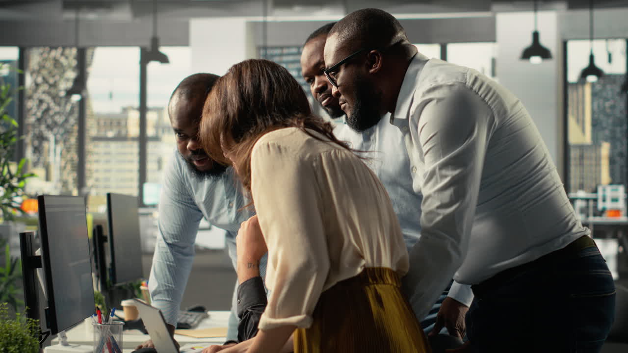 Vertical Video Employees reviewing charts and diagrams during a project briefing