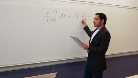 mathematics teacher explaining an integral formula