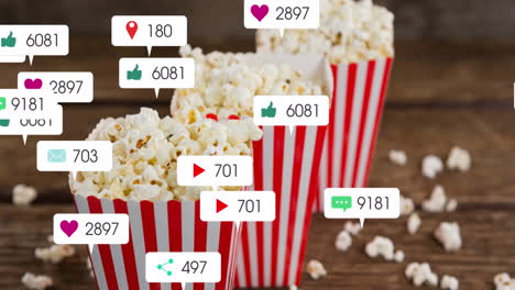 animación de iconos de medios sobre cajas de palomitas de maíz