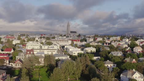 traditional white houses in reykjavik with popular landmark hallgrímskirkja