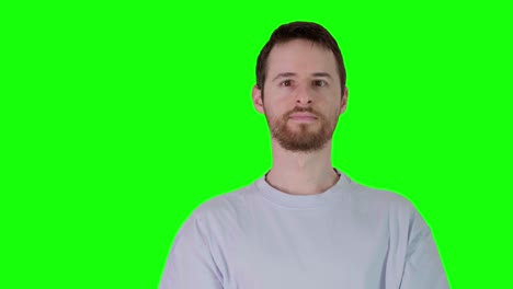 man looks at camera, focused and serious