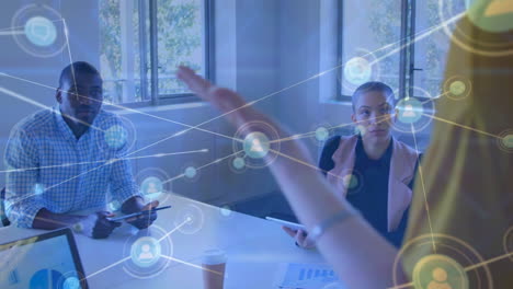 animation of network of connections over diverse businesspeople working in office