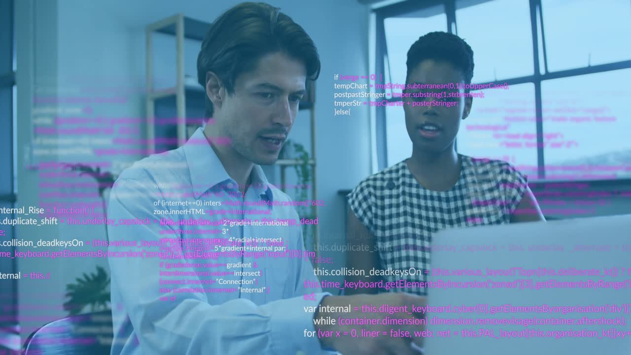 Woman pointing at laptop and speaking, man using laptop, code overlay growing, both reviewing tech