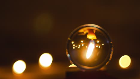 crystal ball and candle light of wizards, concept of the magical mystery of halloween