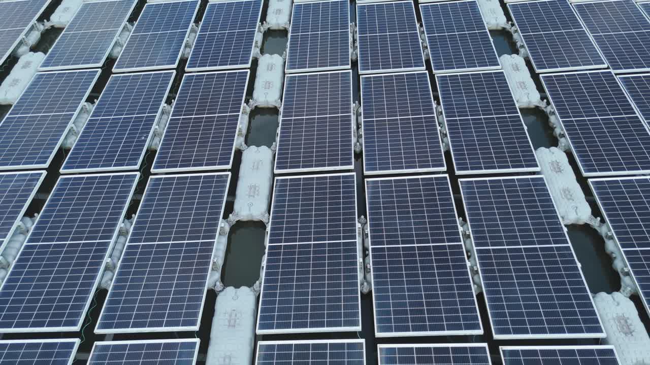 Close-up aerial view of Malaysia’s largest floating solar farm at Danau Tok Uban, Kelantan, showcasing renewable energy innovation and sustainable power generation on water