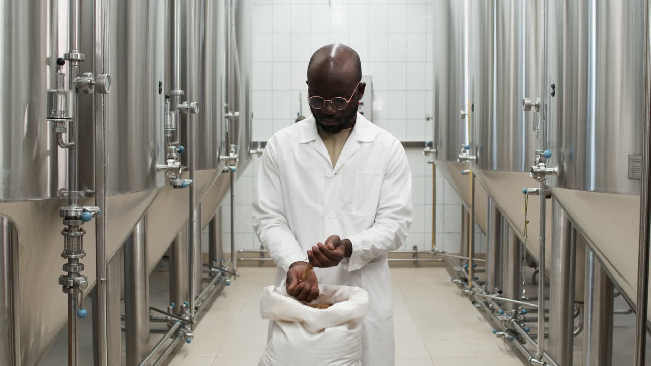 Man grabbing seeds on hand