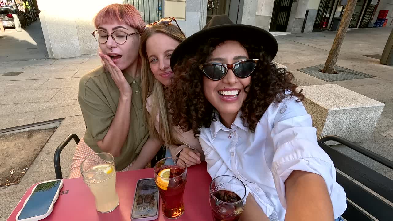 Friends enjoying drinks at a cafe