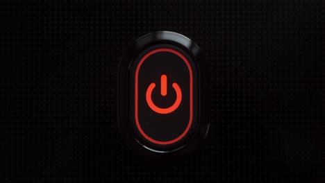 closeup shot of a blinking red power button