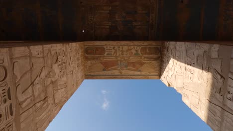 Entrance-to-The-Mortuary-Temple-of-Ramesses-III-at-Medinet-Habu,-static-low-angle-shot