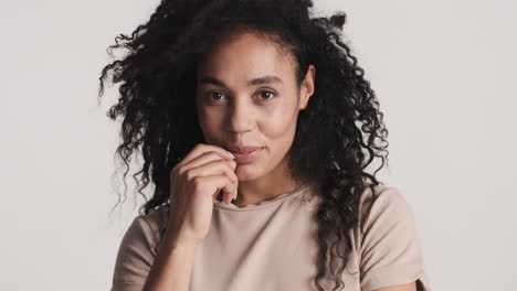 African-american-confident-woman-over-white-background.