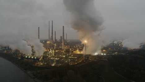 Aerial-view-of-illuminated-petrochemical-factory-during-nightfall