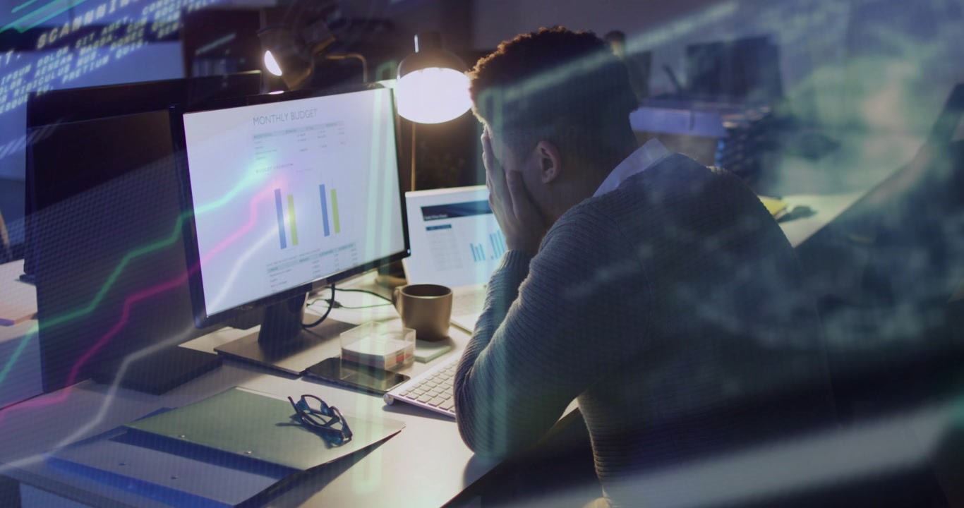 man loading data dashboard studying bar chart on monitor while flickering code overlays insights