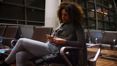 commuters using mobile phone in waiting area 4k