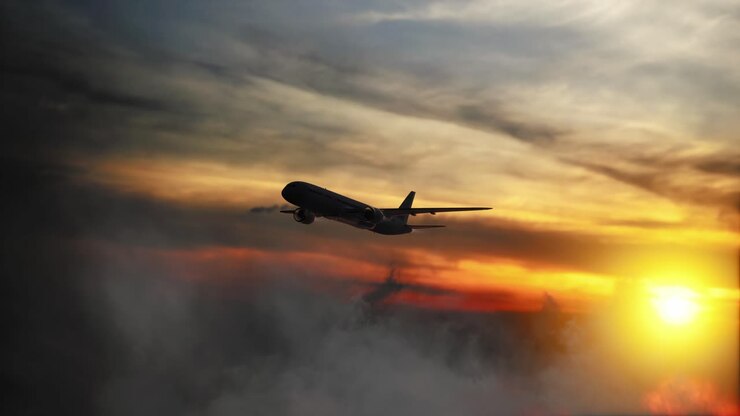 Passenger Airplane High In The Sky. Sunset And Dark Clouds