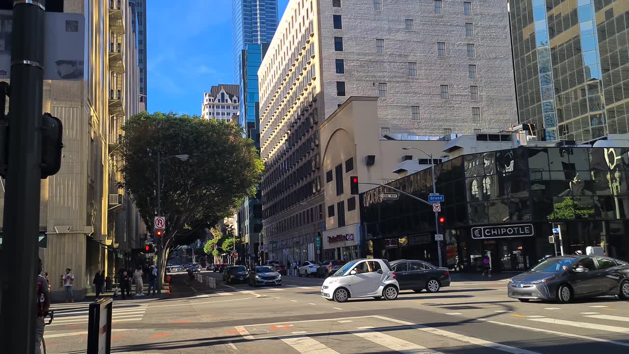 Daytime City Street Scene with Urban Buildings and Traffic