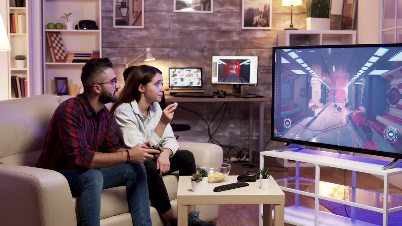 Couple Playing Video Games in Living Room