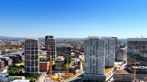 modern skyline of bratislava in slovakia. urban development in bratislava showcases contemporary architecture and construction under a clear blue sky