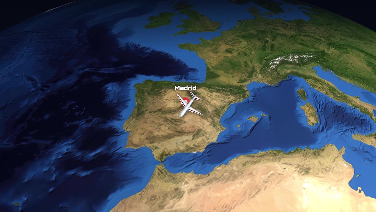 Satellite view animation follows a commercial airplane flying from Tokyo to Madrid across the globe