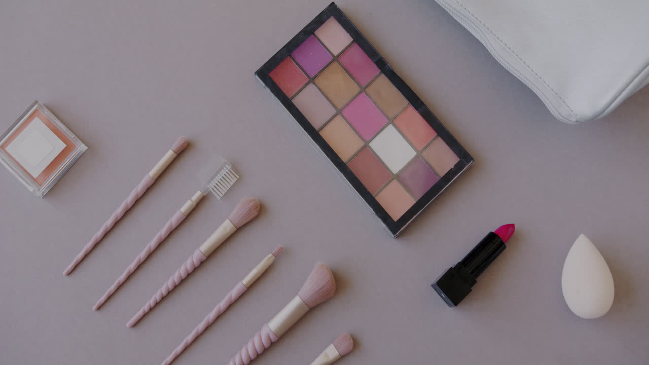 Flat lay of makeup products and tools