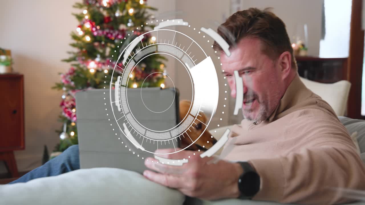 Mature man looking at tablet, initiating AR HUD, gesturing, rotating house model, reviewing design