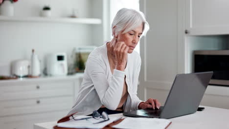 Senior-woman,-laptop-and-home-for-online-research