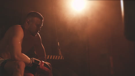 Concentrated-Man-Boxer-Resting-And-Looking-At-Infinity