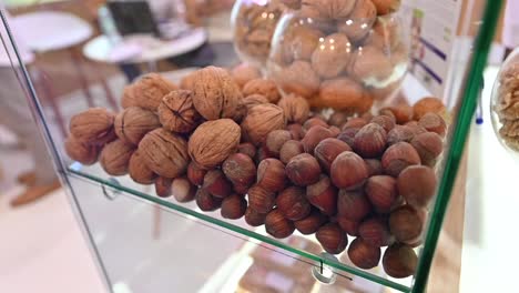 Closeup-of-Walnuts-and-Hazelnuts-are-displayed-during-the-Gulf-Food-exhibition,-United-Arab-Emirates