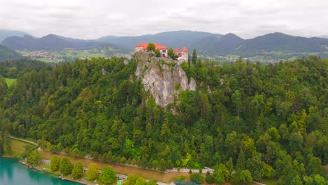 stunning drone footage of lake bled, slovenia, showcasing the iconic island, castle, and lush landscapes