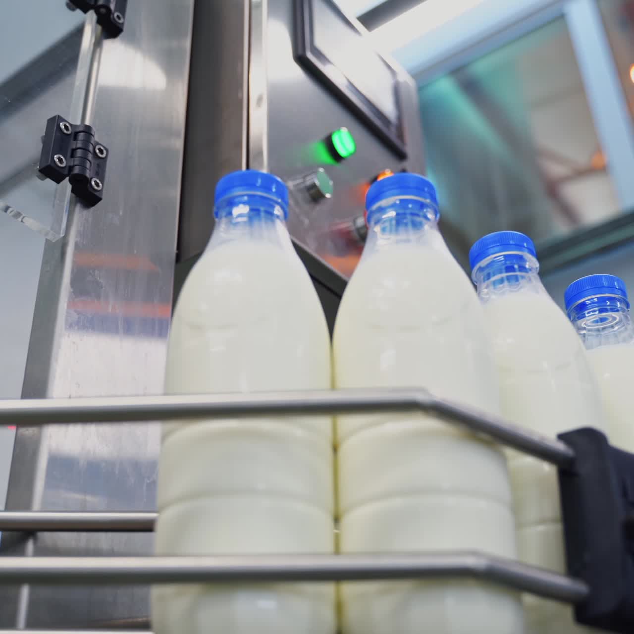Fresh milk poured into bottles