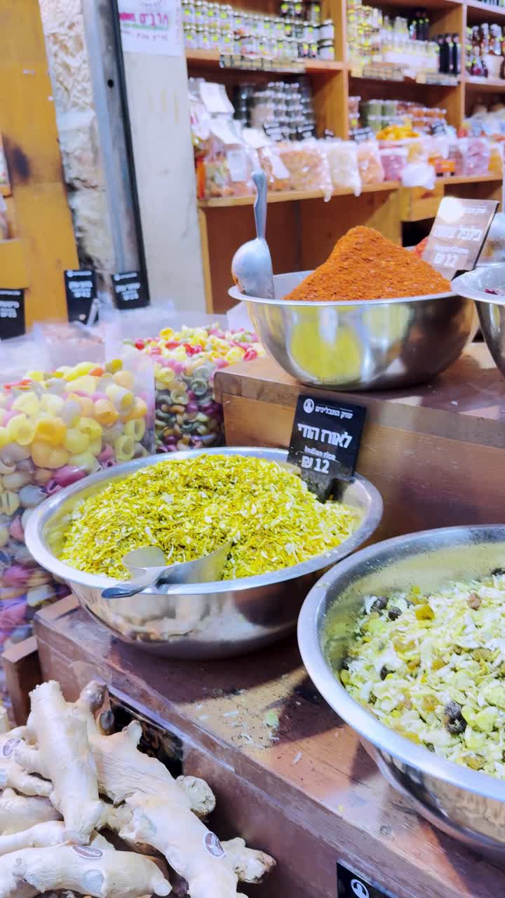 Spices and pasta for sale in jerusalem old city market stall