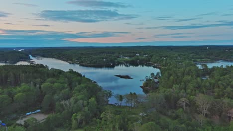 Beautiful-landscape-aerial-above-Moffat-Cove-at-sunset