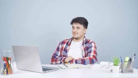 Man-making-video-call-on-laptop.